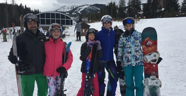 katrina Lusk and family skiing
