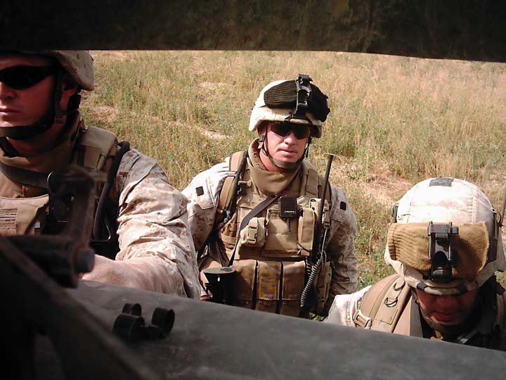 Shane Murray in uniform with fellow soldiers.