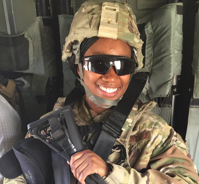 Jasmine Paul in military gear.