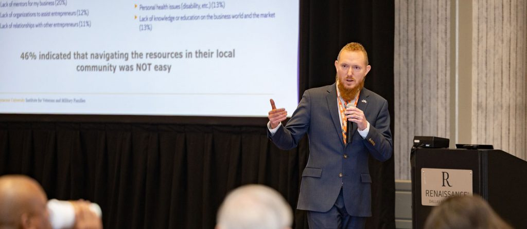 Adam speaking at veteran edge 2025