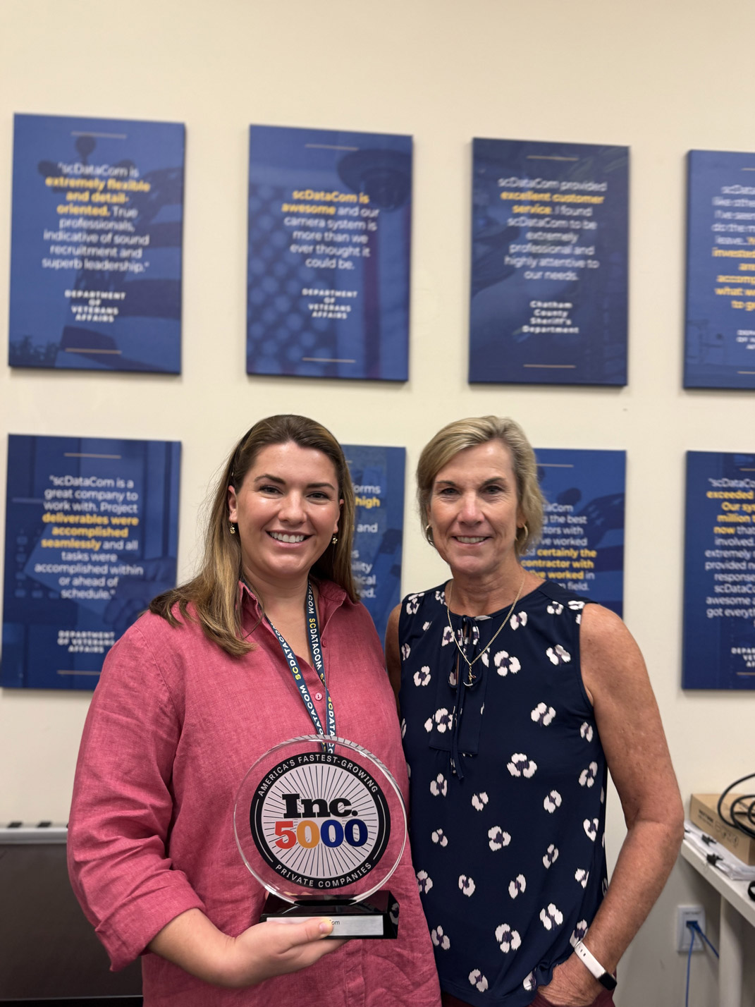 Kathleen and Alaina holding their inc. 5000 award