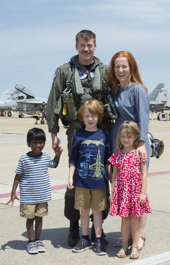 Kate and her family at the airfield.