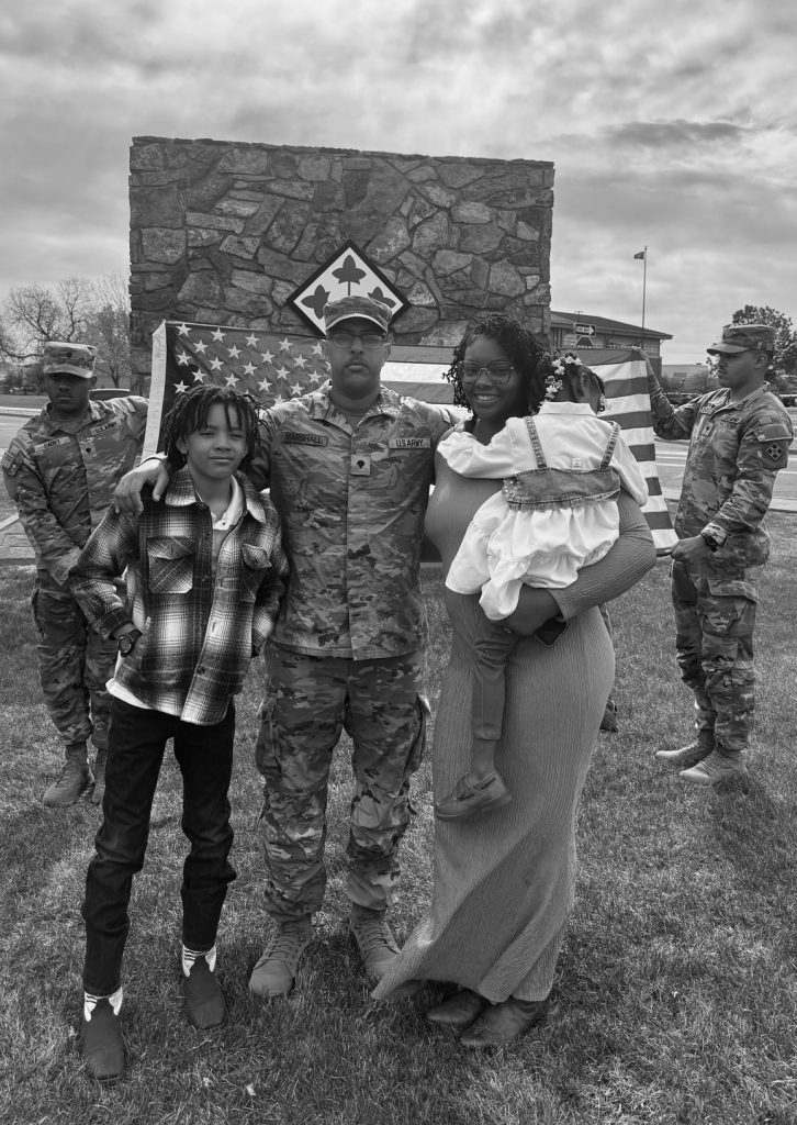 Bessie Mullins with her husband and son