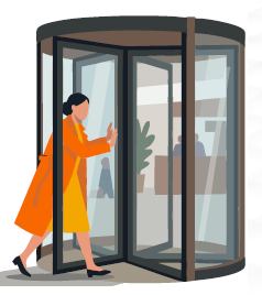 Woman walking through revolving door.