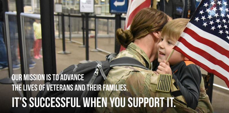  Female soldier hugging her child in an airport with caption reading "our mission is to advance the lives of veterans and their families. It's successful when you support it." 